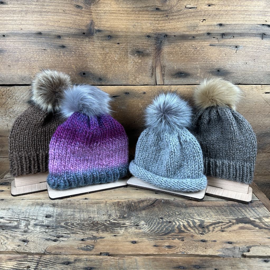 Kids&#39; Hand-Knit Pom Pom Hats