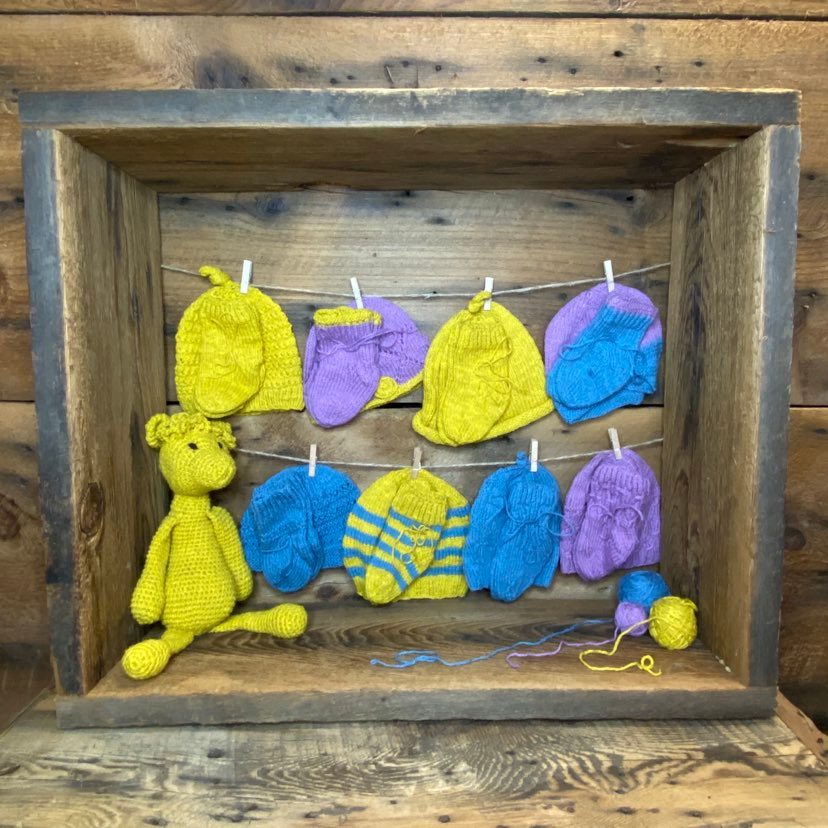 Hand-Knit Newborn Sets by Marcella