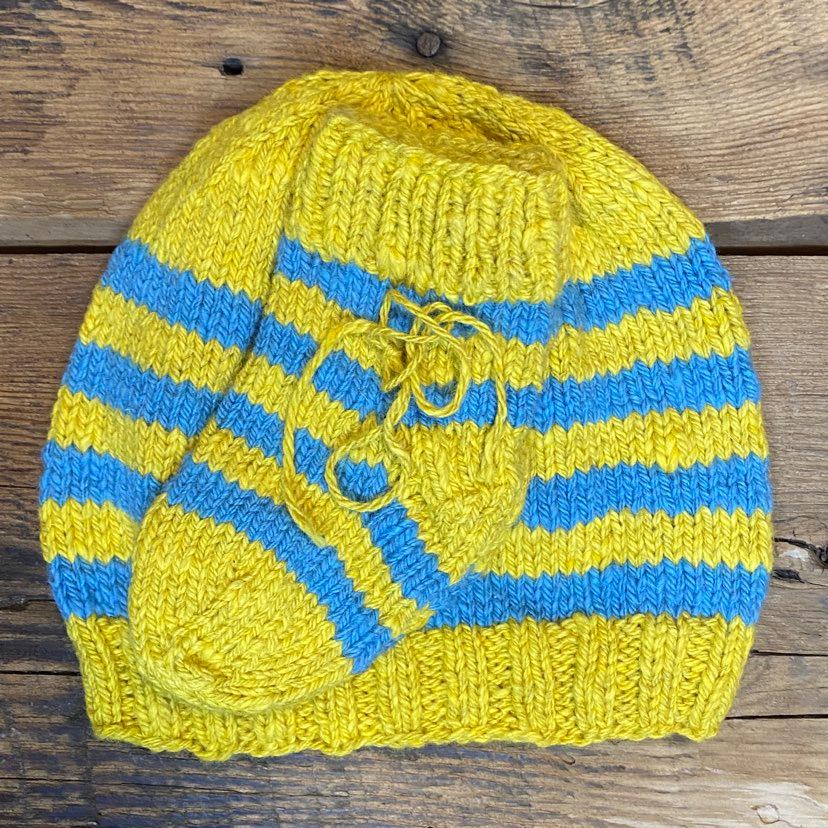 Hand-Knit Newborn Sets by Marcella